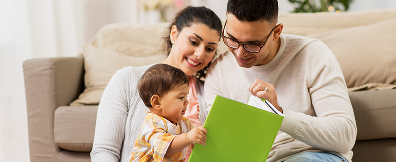 parents reading to their child