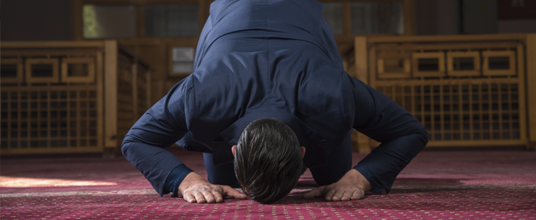 Man praying in mosque