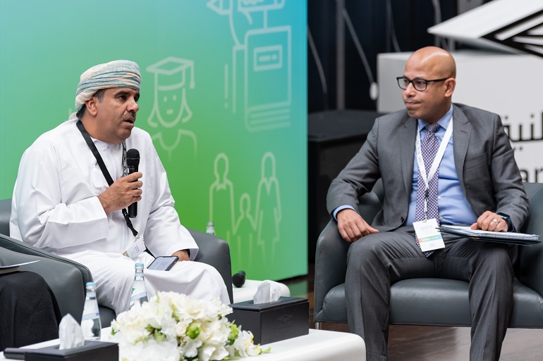 Dr. Nabhan Al Harrasi, Arab Federation for Libraries and Information speaking at the Panel Discussion.  Dr. Yehia Abdelmobdy Mohamed, Georgetown University in Qatar, moderated the discussion. 
