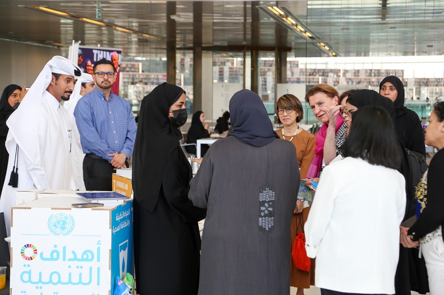 Tan Huism and Barbara Lison interacting with attendees